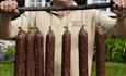 The host at Sygaard Grytting shows home made cured meats