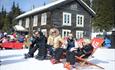 Skiers taking a break in Kvitfjell
