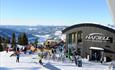 Outdoor serving at Skavlen in wintertime with a lot of ski guests