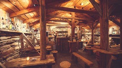 An old barn is made into a bar where we serve over 100 differend types of aquavit. Spidsbergseter Resort Rondane.