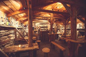 An old barn is made into a bar where we serve over 100 differend types of aquavit. Spidsbergseter Resort Rondane.