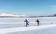 Two women classic cross country skiing Venabygdsfjellet