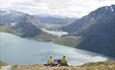 Couple enjoying the view from Besseggen | Venabu Fjellhotell