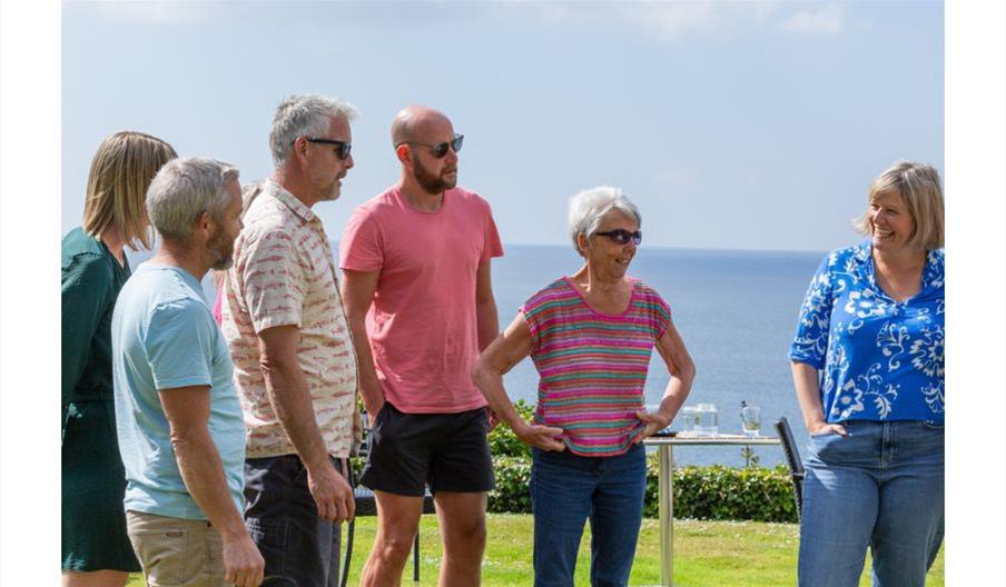 group with sea in background