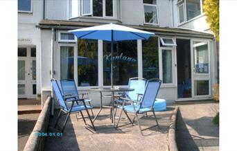 Picture of outdoor seating in front of guest house