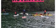 Paddle boarding with Fowey River Hire