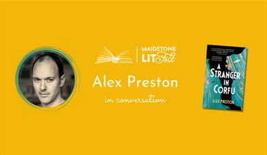 Photo of the author with the LitFest logo