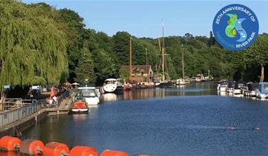 A view of the river Medway looking towards the Malta Inn. Boats moored on the river