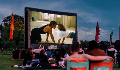 Outdoor cinema showing Dirty Dancing on screen