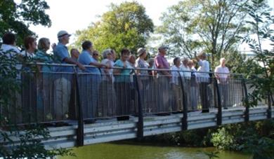 Group on Historic Walking Tour on Maidstone Millennium bridge