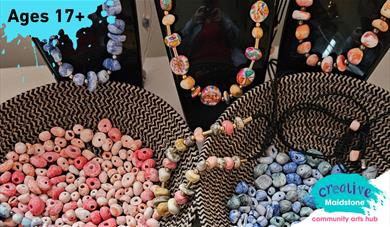 Two baskets of porcelain beads and three porcelain bead necklaces on head mannequins