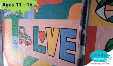 A bright section of street art with the word 'Love' in the middle