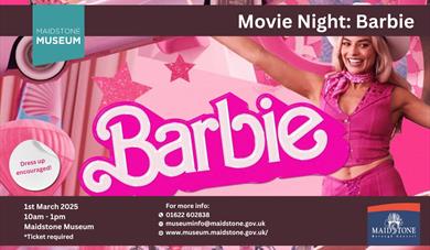 Margot Robbie as Barbie with Barbie iconography scattered around her, She's wearing a bright pink waist coast and trousers, and a cowboy hat. 