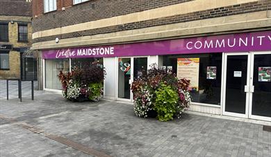 Outside the Creative Maidstone building with the large Flower Beds in bloom