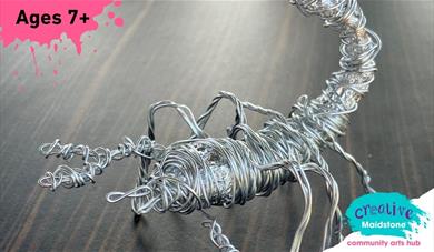 Handmade scorpion made out of wire and tin foil