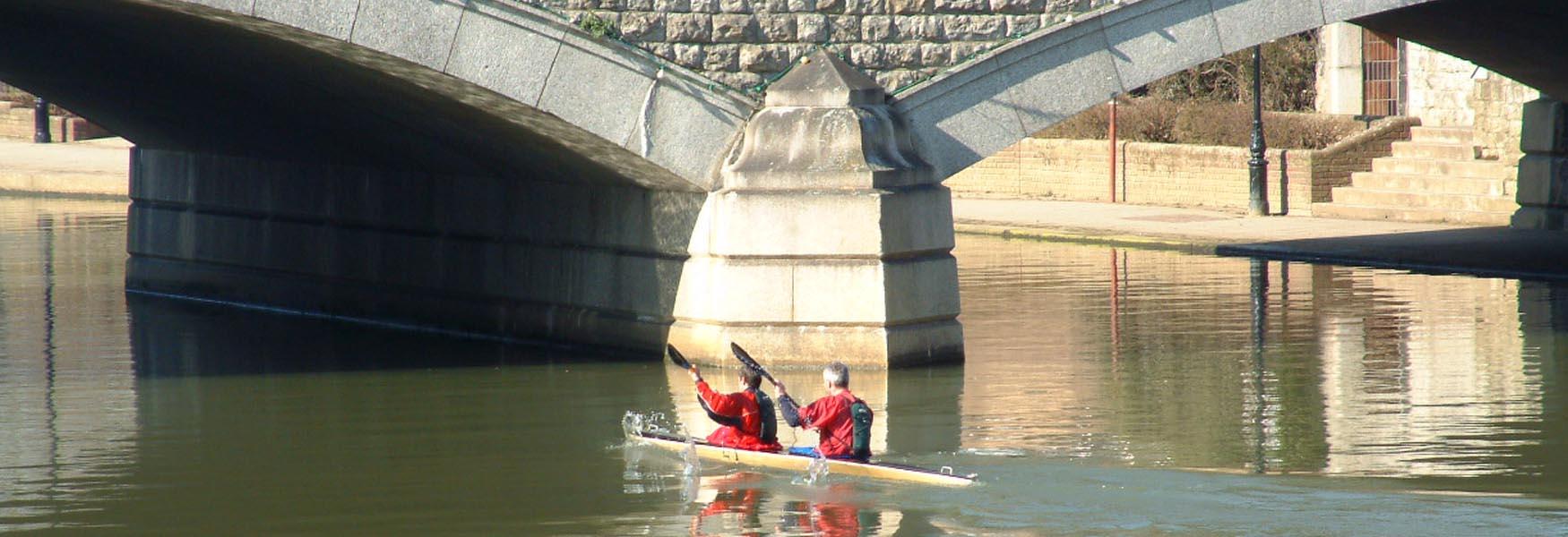 Canoeists under the bridge on the River Medway in Maidstone