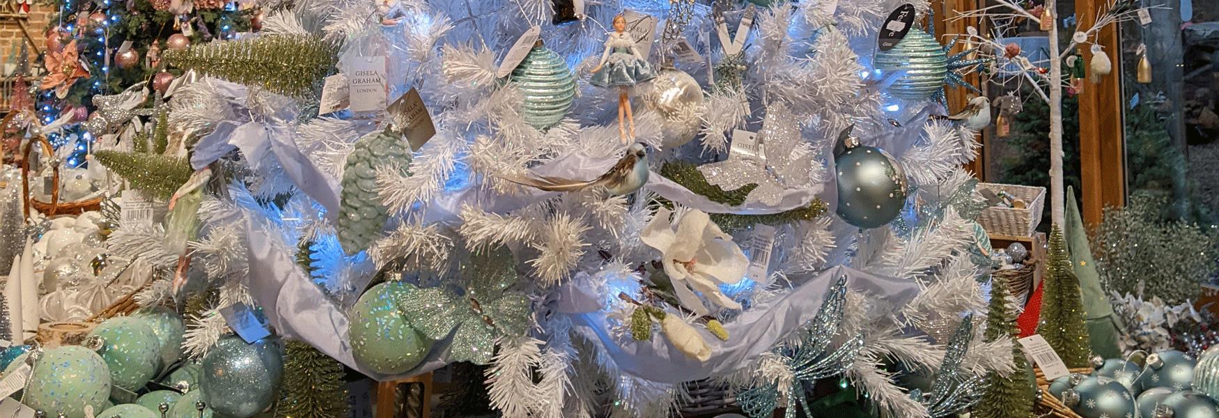 Come Christmas shopping in Maidstone.  There are lots of independent shops, lots of chain stores and you can enjoy a break at one of the lovely cafes on the way. Silver and White Christmas baubles and decorations.