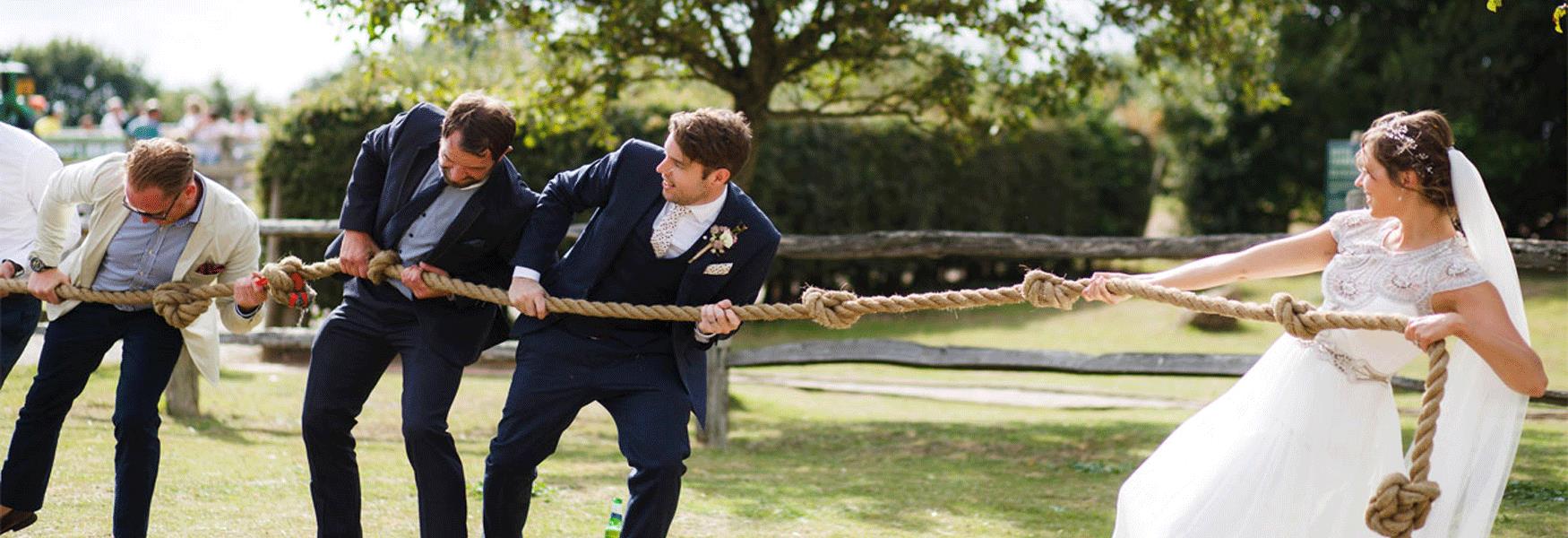 Wedding Tug of War with bride and groomsmen