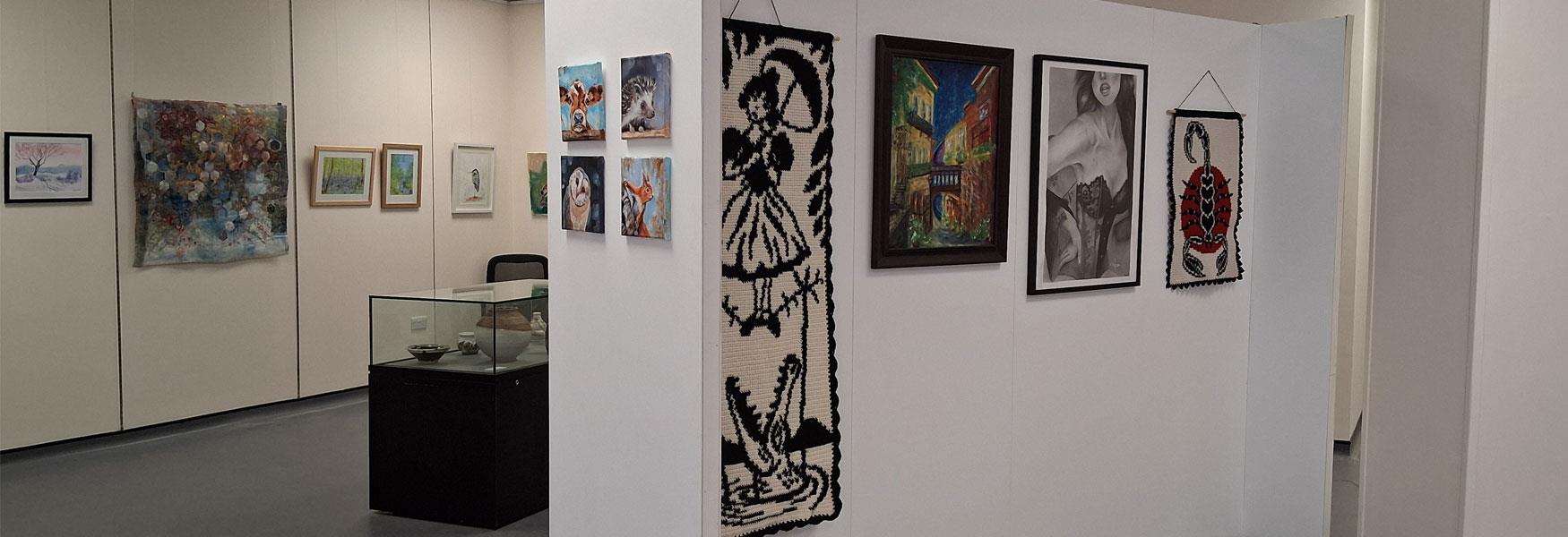 Exhibition space with painting and displays