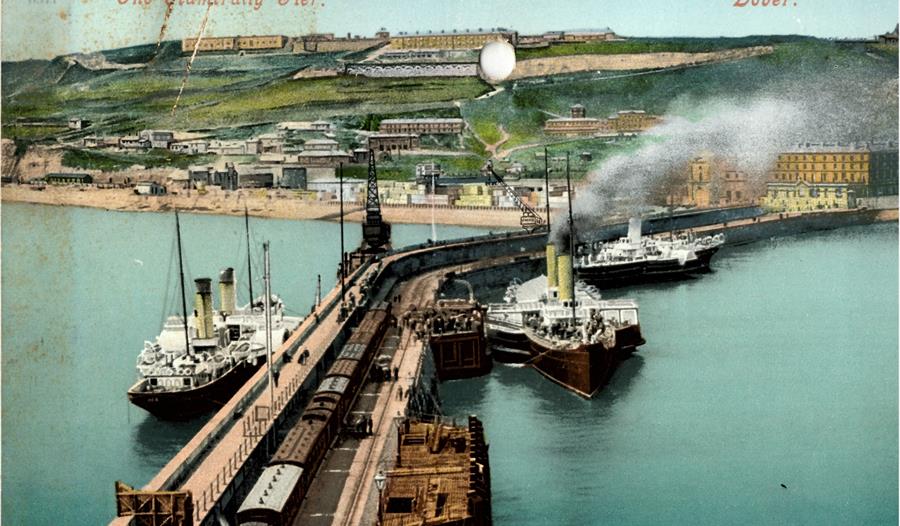 coloured postcard showing the Admiralty Pier, Dover, before its widening in circa 1909