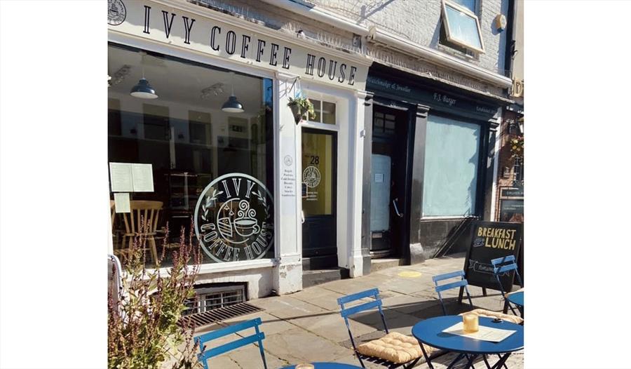 Ivy Coffee House exterior with outside tables and chairs