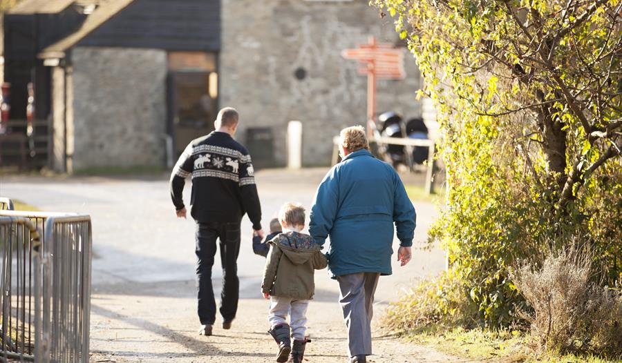 Family walking at Kent Life