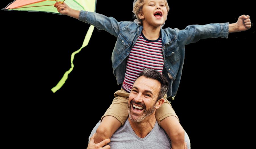 father and son with kite