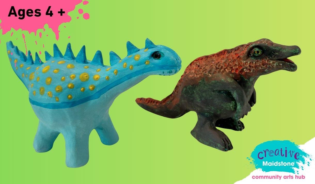 Two dinosaurs made of air dry clay