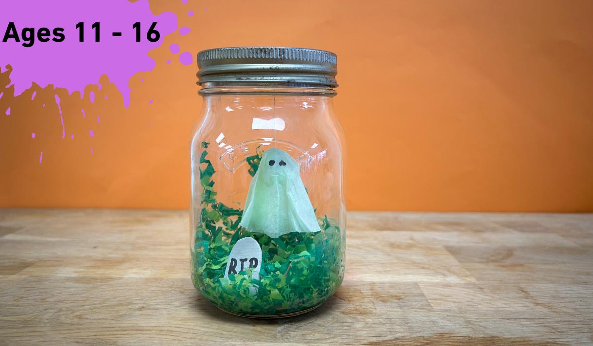 Paint splat with ages 11 - 16 in the middle. Main image a small ghost floating in a jar decorated like a cemetery