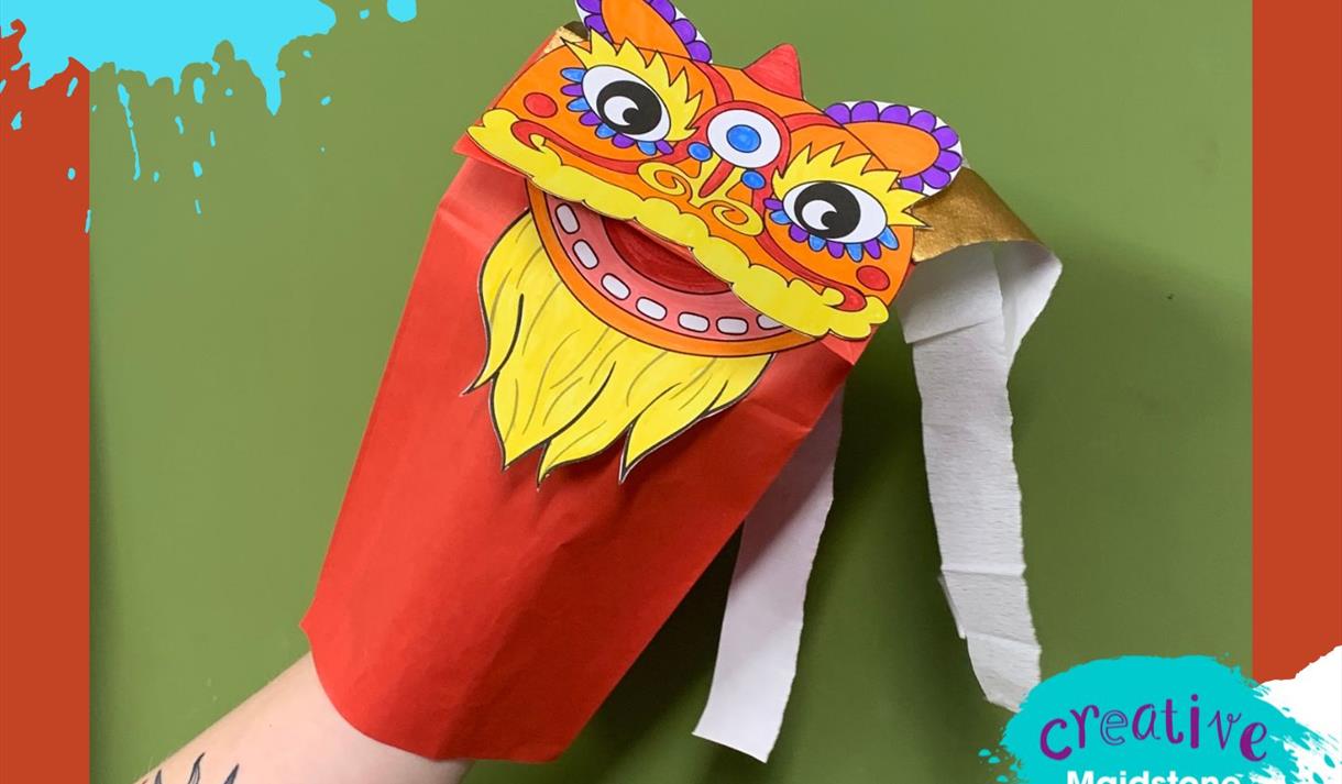 Lion hand puppet made out of card and paper