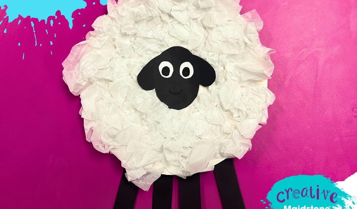 Sheep made out of a paper plate and tissue papers