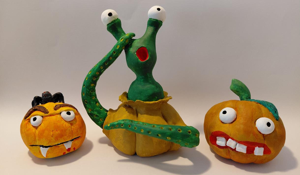 Three scary handmade pumpkins