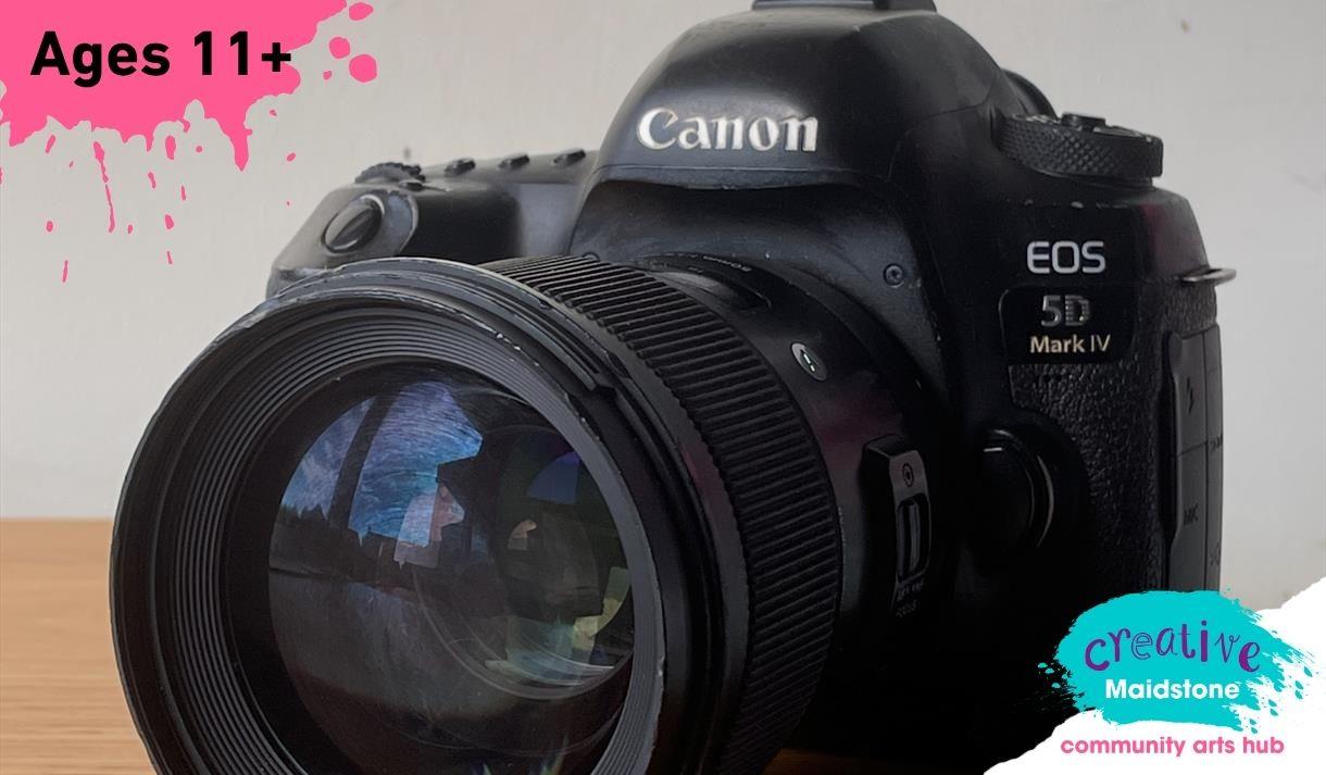 Digital camera on a plain background