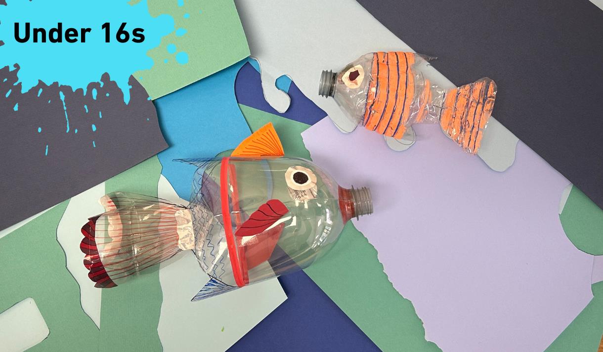In the upper left corner a Paint Splat with Under 16s written inside it. Main image two fishes made from plastic bottles facing each other