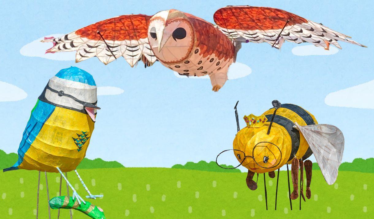 Willow sculpture owl, bluetit and bee on a cartoon background of blue sky and green fields