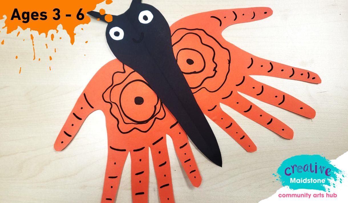 Paper butterfly made from a child's handprints