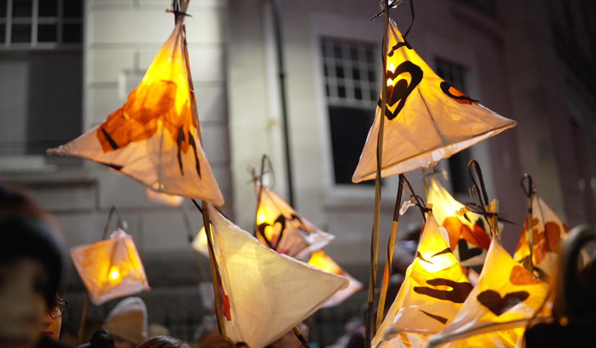 Willow and paper lanterns in a parade
