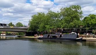 Old Boat Cafe from across the river