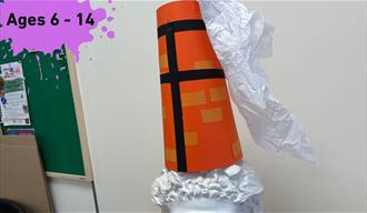 Ages 6 - 14 on a paint splat on the top left corner. main image a hat made to look like a chimney with tissue paper coming out of the top.