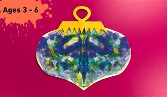 Paint splat with Ages 3 - 6 on top. Main Image: a blue & yellow paper Bauble