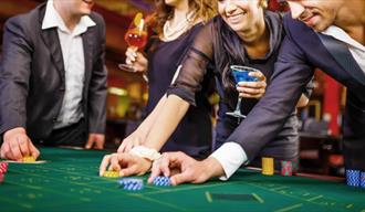 Casino and cocktails people with gambling chips