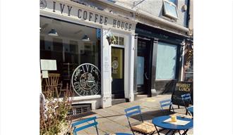 Ivy Coffee House exterior with outside tables and chairs