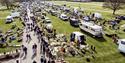 Aerial view of Detling Showground with antiques stalls and people browsing