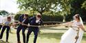 Bridal party tug of war at Kent Life