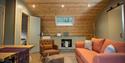 Open plan layout with kitchen and seating area