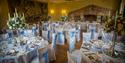 Wedding reception set up in blue and white in the Maiden's Tower, Leeds Castle