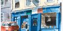 Child hurried by mother along Lower Stone Street
