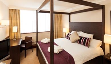 Four poster room at the Mercure Great Danes Hotel