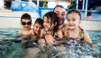 Family in the pool at Maidstone Leisure Centre