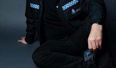 Cop-turned-comedian Alfie Moore in uniform